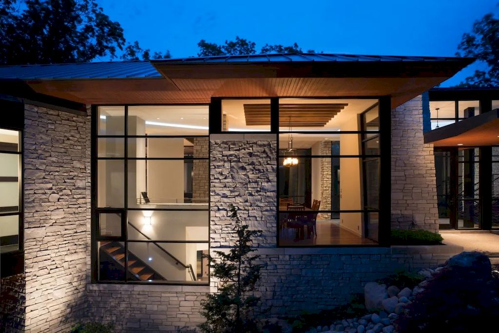 The Home in Michigan is a luxurious home having full stone exterior now available for sale. This home located at 6956 Cooley Lake Rd, White Lake, Michigan; offering 05 bedrooms and 05 bathrooms with 7,153 square feet of living spaces.