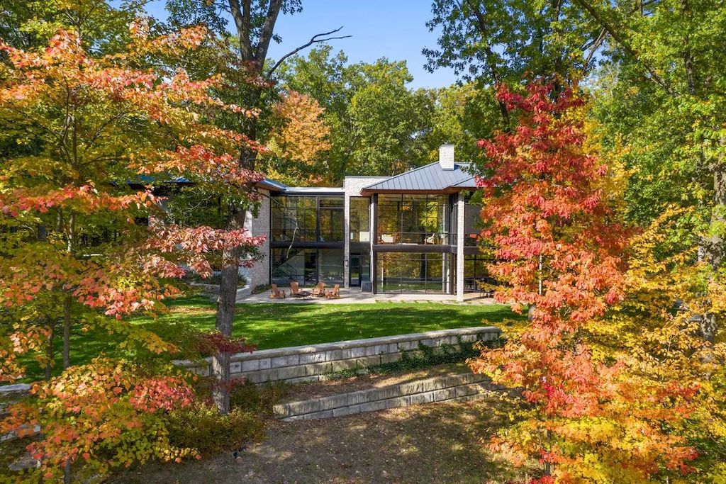 The Home in Michigan is a luxurious home having full stone exterior now available for sale. This home located at 6956 Cooley Lake Rd, White Lake, Michigan; offering 05 bedrooms and 05 bathrooms with 7,153 square feet of living spaces.