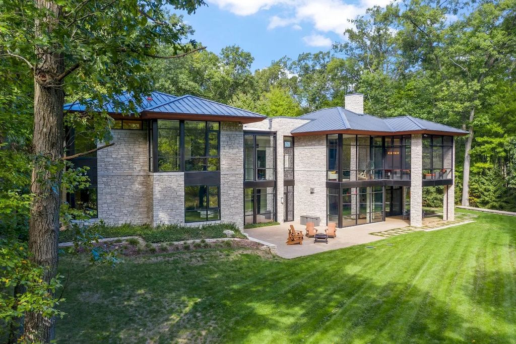 The Home in Michigan is a luxurious home having full stone exterior now available for sale. This home located at 6956 Cooley Lake Rd, White Lake, Michigan; offering 05 bedrooms and 05 bathrooms with 7,153 square feet of living spaces.