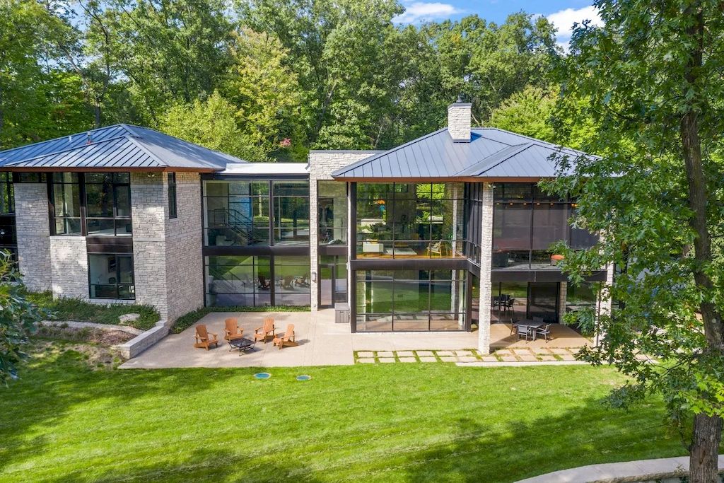 The Home in Michigan is a luxurious home having full stone exterior now available for sale. This home located at 6956 Cooley Lake Rd, White Lake, Michigan; offering 05 bedrooms and 05 bathrooms with 7,153 square feet of living spaces.