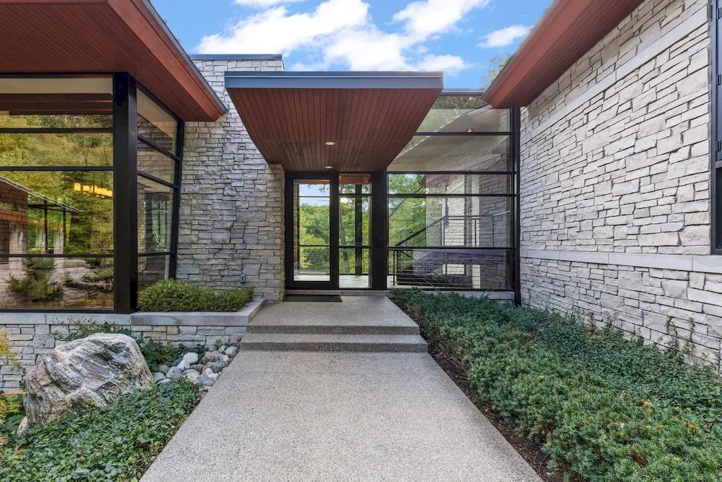 The Home in Michigan is a luxurious home having full stone exterior now available for sale. This home located at 6956 Cooley Lake Rd, White Lake, Michigan; offering 05 bedrooms and 05 bathrooms with 7,153 square feet of living spaces.