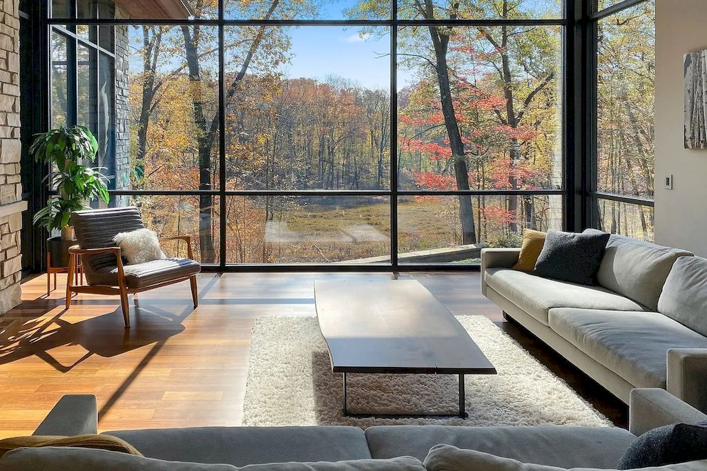 The Home in Michigan is a luxurious home having full stone exterior now available for sale. This home located at 6956 Cooley Lake Rd, White Lake, Michigan; offering 05 bedrooms and 05 bathrooms with 7,153 square feet of living spaces.