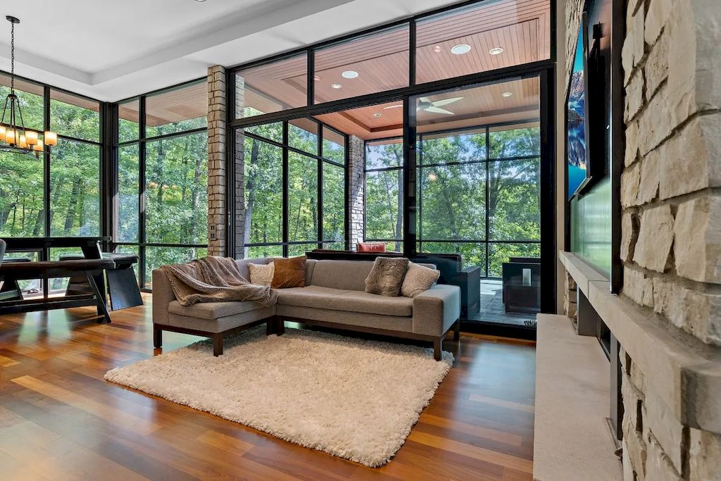 The Home in Michigan is a luxurious home having full stone exterior now available for sale. This home located at 6956 Cooley Lake Rd, White Lake, Michigan; offering 05 bedrooms and 05 bathrooms with 7,153 square feet of living spaces.
