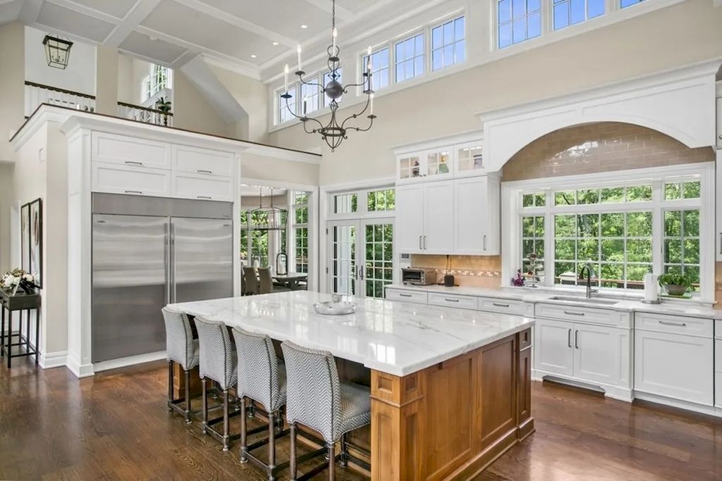 The Home in New Jersey is a luxurious farmhouse compounds featuring soaring ceilings, glass walls, a beautiful pool, a gallery and more now available for sale. This home located at 255 E Saddle River Rd, Saddle River, New Jersey; offering 06 bedrooms and 07 bathrooms with approximately 10 acres of land.