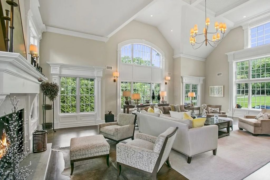 The Home in New Jersey is a luxurious farmhouse compounds featuring soaring ceilings, glass walls, a beautiful pool, a gallery and more now available for sale. This home located at 255 E Saddle River Rd, Saddle River, New Jersey; offering 06 bedrooms and 07 bathrooms with approximately 10 acres of land.