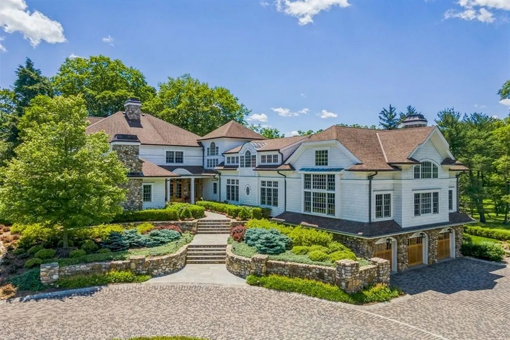 The Home in New Jersey is a luxurious farmhouse compounds featuring soaring ceilings, glass walls, a beautiful pool, a gallery and more now available for sale. This home located at 255 E Saddle River Rd, Saddle River, New Jersey; offering 06 bedrooms and 07 bathrooms with approximately 10 acres of land.
