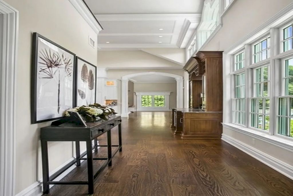 The Home in New Jersey is a luxurious farmhouse compounds featuring soaring ceilings, glass walls, a beautiful pool, a gallery and more now available for sale. This home located at 255 E Saddle River Rd, Saddle River, New Jersey; offering 06 bedrooms and 07 bathrooms with approximately 10 acres of land.