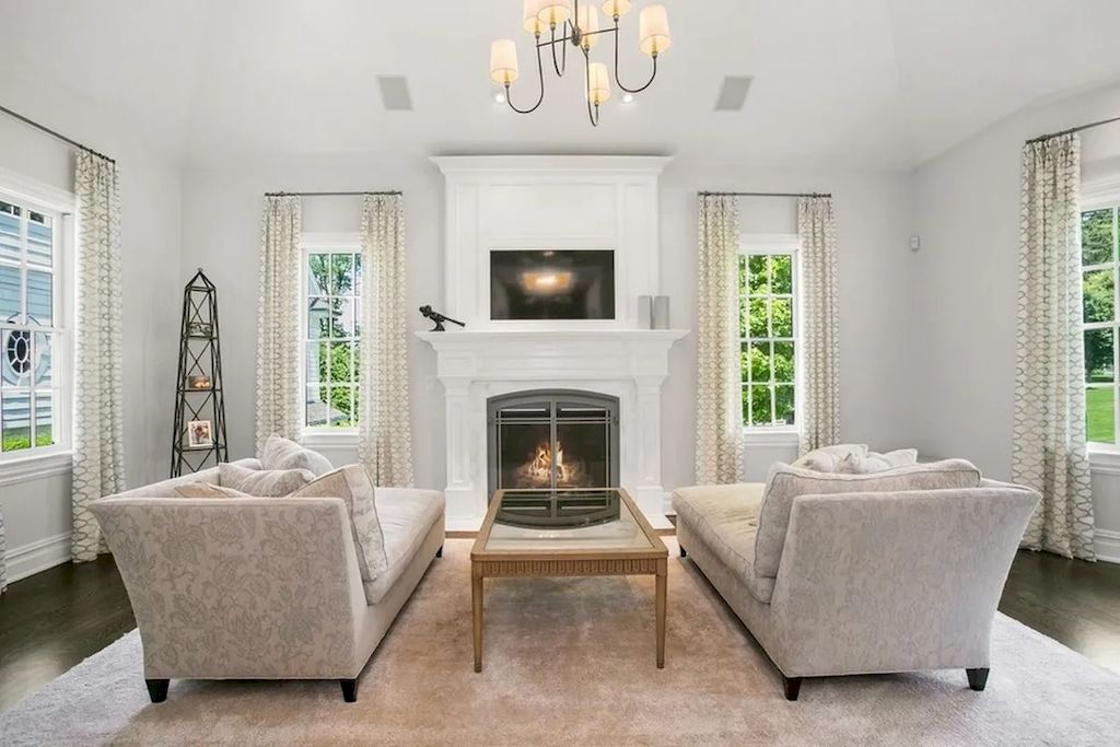 The Home in New Jersey is a luxurious farmhouse compounds featuring soaring ceilings, glass walls, a beautiful pool, a gallery and more now available for sale. This home located at 255 E Saddle River Rd, Saddle River, New Jersey; offering 06 bedrooms and 07 bathrooms with approximately 10 acres of land.