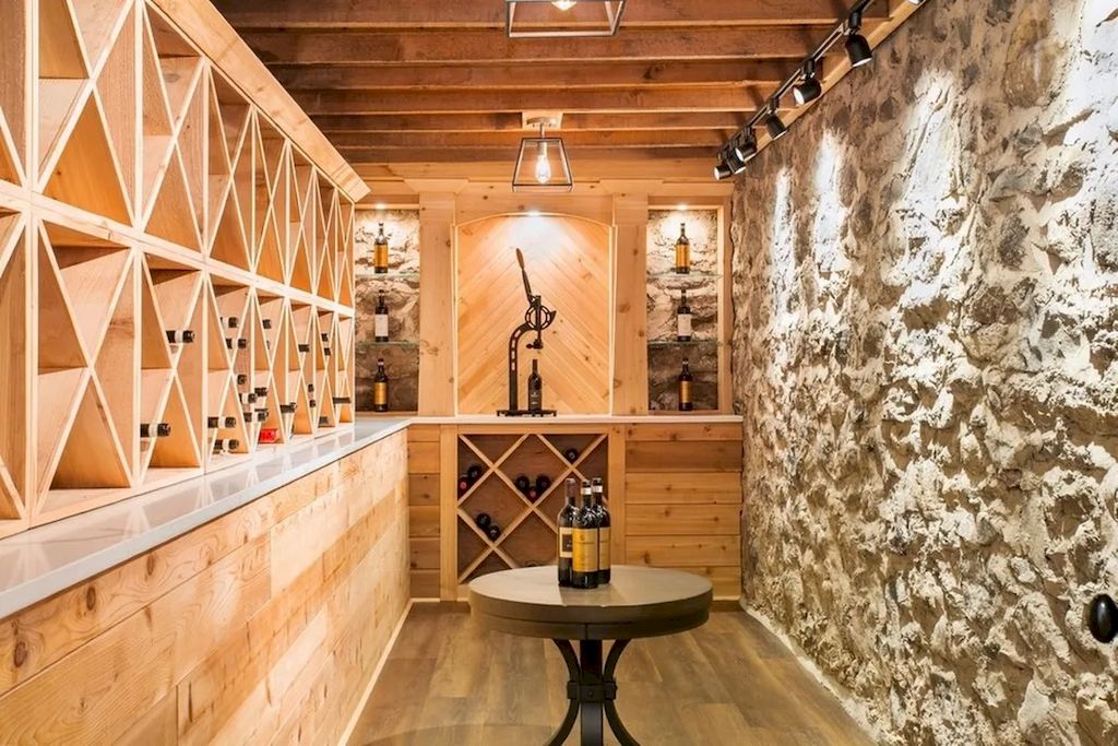 The Home in New Jersey is a luxurious farmhouse compounds featuring soaring ceilings, glass walls, a beautiful pool, a gallery and more now available for sale. This home located at 255 E Saddle River Rd, Saddle River, New Jersey; offering 06 bedrooms and 07 bathrooms with approximately 10 acres of land.