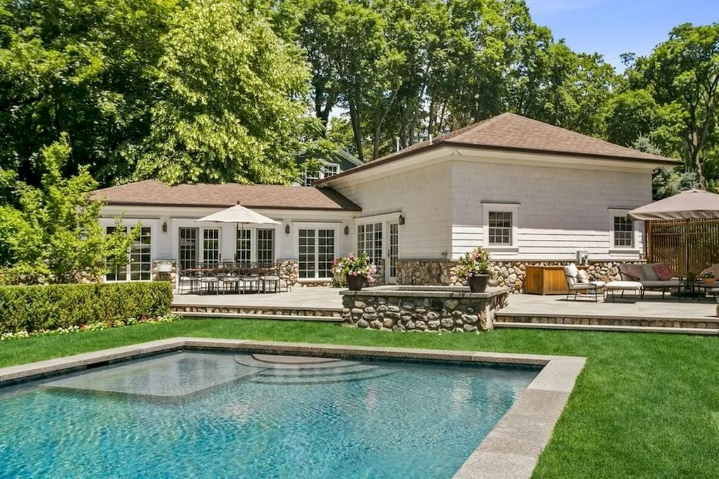 The Home in New Jersey is a luxurious farmhouse compounds featuring soaring ceilings, glass walls, a beautiful pool, a gallery and more now available for sale. This home located at 255 E Saddle River Rd, Saddle River, New Jersey; offering 06 bedrooms and 07 bathrooms with approximately 10 acres of land.