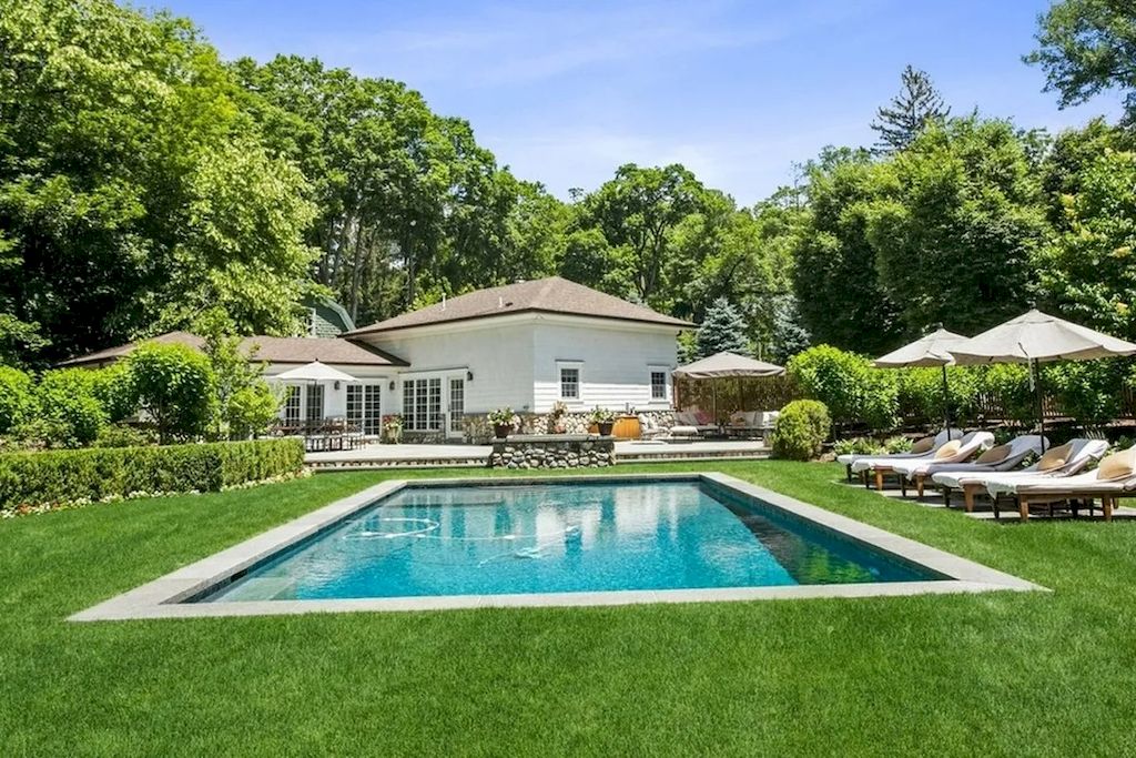 The Home in New Jersey is a luxurious farmhouse compounds featuring soaring ceilings, glass walls, a beautiful pool, a gallery and more now available for sale. This home located at 255 E Saddle River Rd, Saddle River, New Jersey; offering 06 bedrooms and 07 bathrooms with approximately 10 acres of land.
