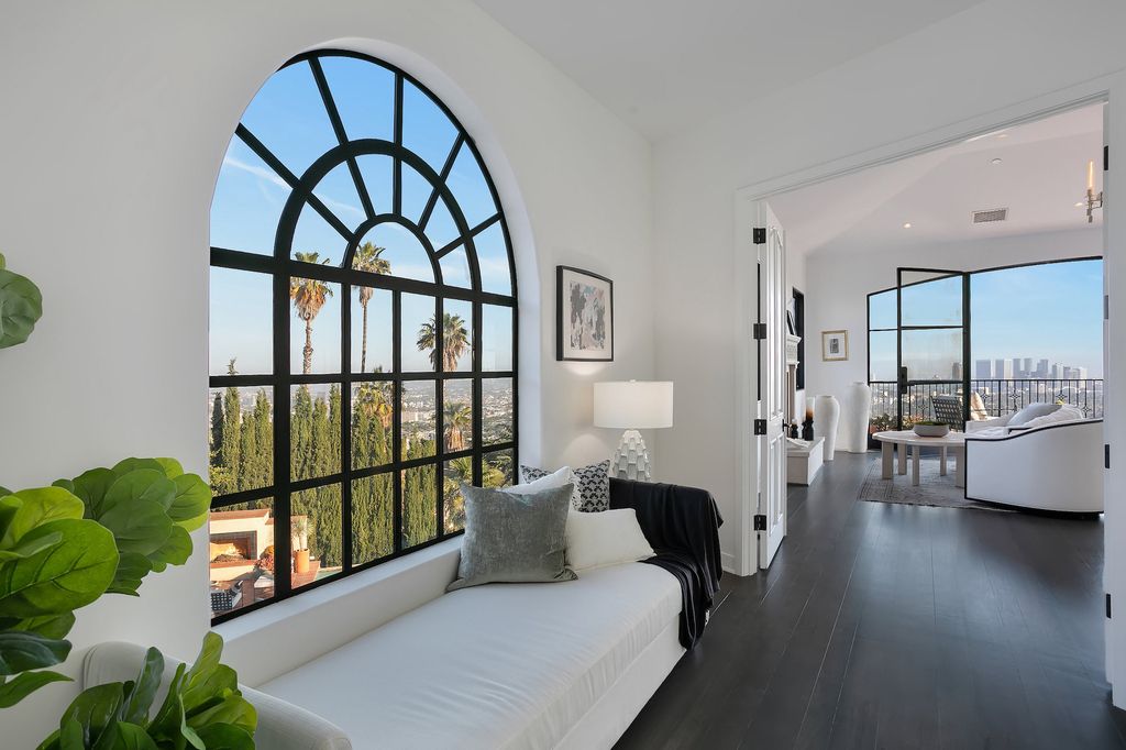 The Villa in Los Angeles is a newly built compound with separate guest house and pool bath perfect for for entertaining now available for sale. This home located at 9368 Flicker Way, Los Angeles, California