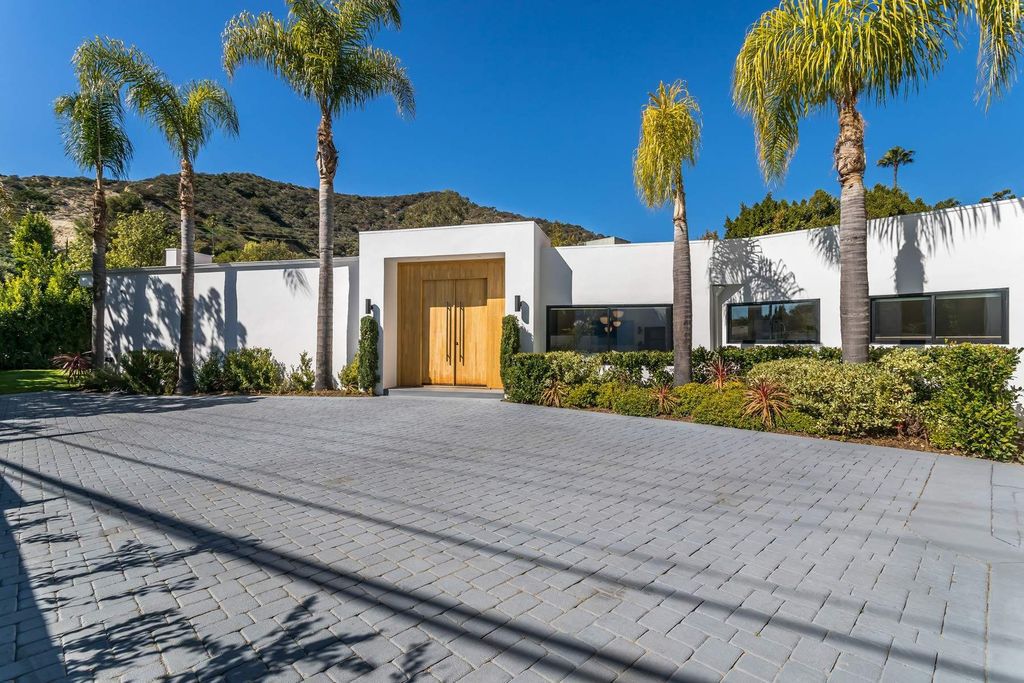 The Home in Beverly Hills is a stunning contemporary compound in a coveted lower Coldwater Canyon now available for sale. This home located at 9565 Cherokee Ln, Beverly Hills, California