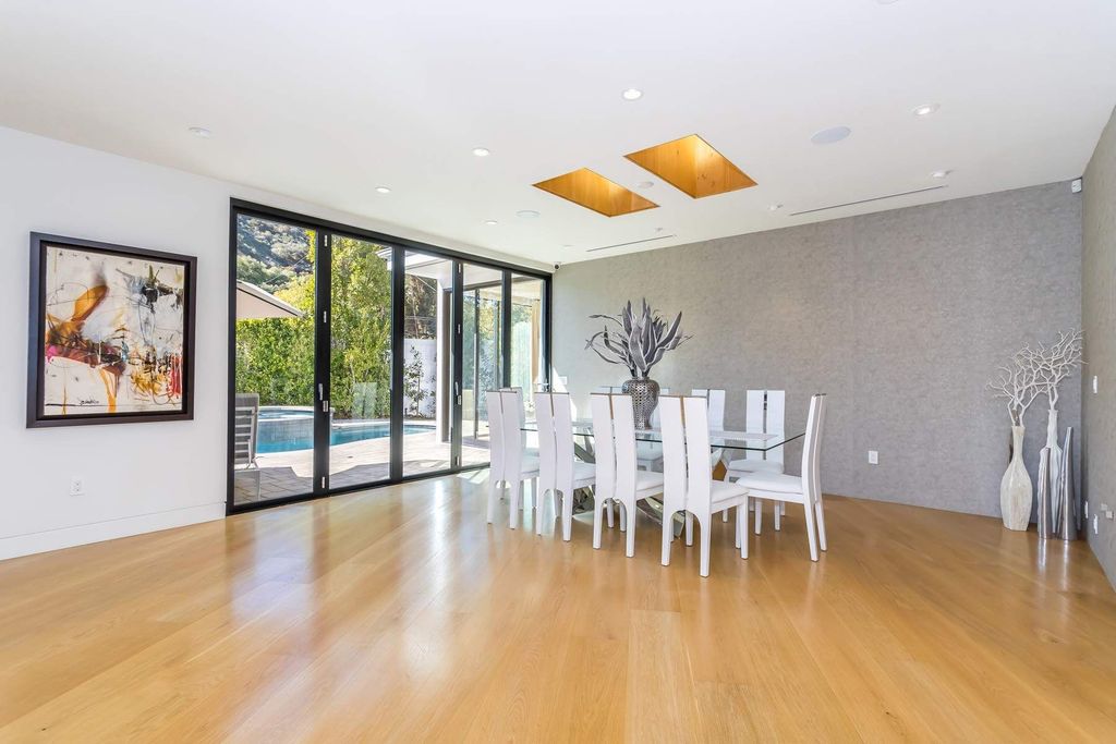 The Home in Beverly Hills is a stunning contemporary compound in a coveted lower Coldwater Canyon now available for sale. This home located at 9565 Cherokee Ln, Beverly Hills, California
