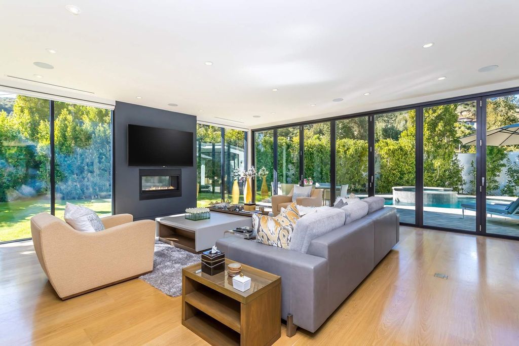 The Home in Beverly Hills is a stunning contemporary compound in a coveted lower Coldwater Canyon now available for sale. This home located at 9565 Cherokee Ln, Beverly Hills, California