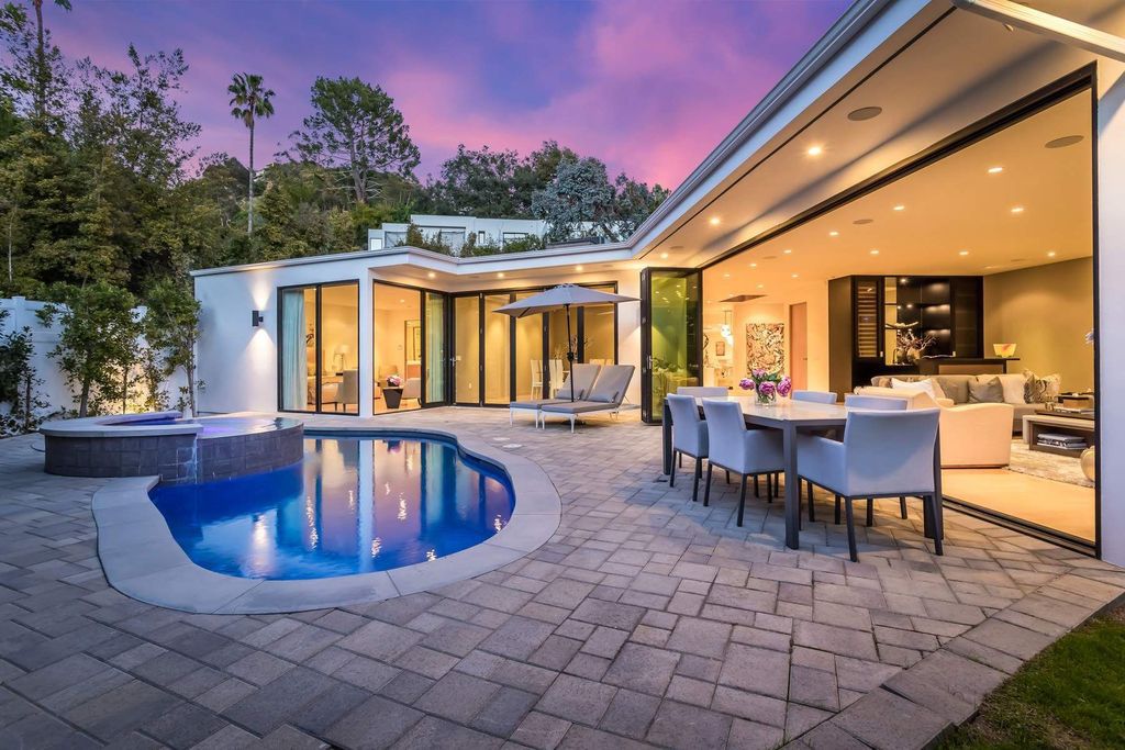 The Home in Beverly Hills is a stunning contemporary compound in a coveted lower Coldwater Canyon now available for sale. This home located at 9565 Cherokee Ln, Beverly Hills, California