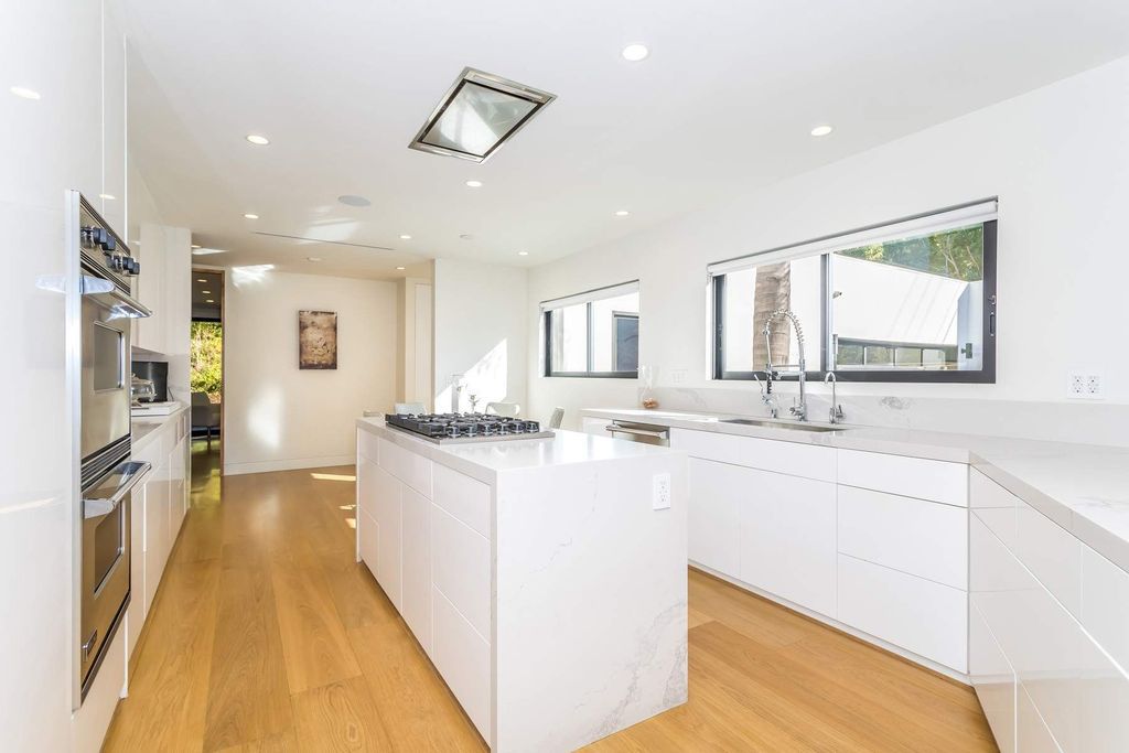 The Home in Beverly Hills is a stunning contemporary compound in a coveted lower Coldwater Canyon now available for sale. This home located at 9565 Cherokee Ln, Beverly Hills, California