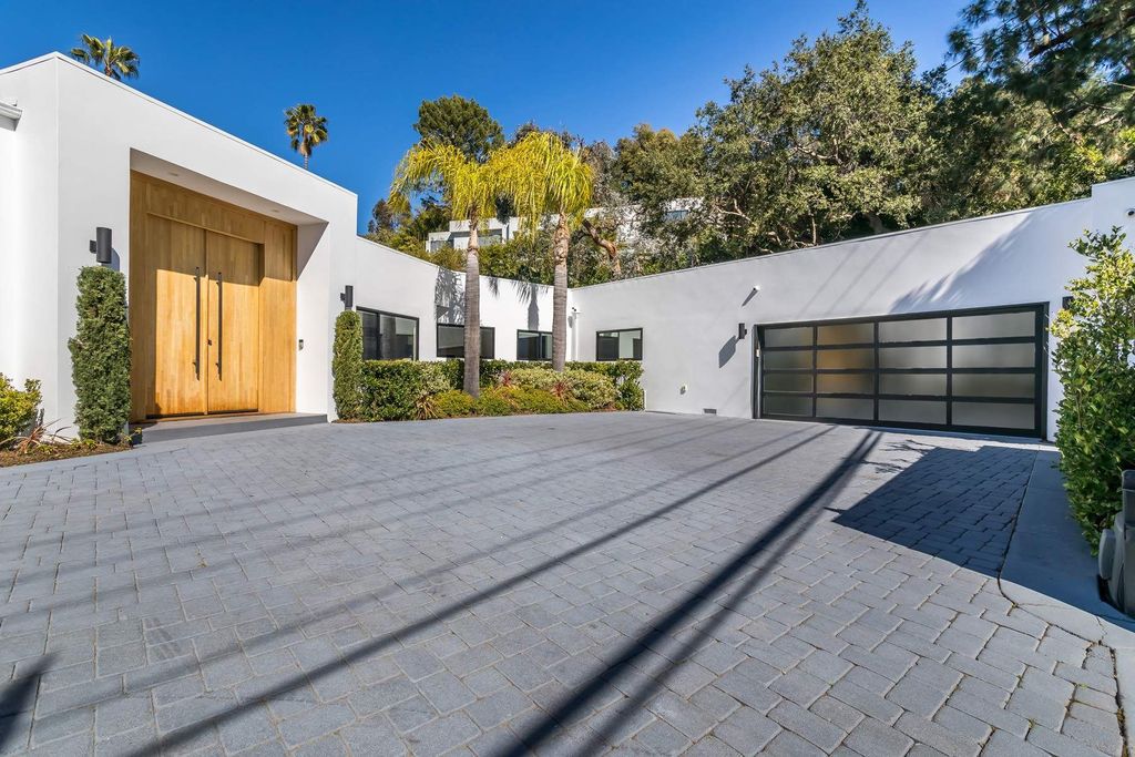 The Home in Beverly Hills is a stunning contemporary compound in a coveted lower Coldwater Canyon now available for sale. This home located at 9565 Cherokee Ln, Beverly Hills, California