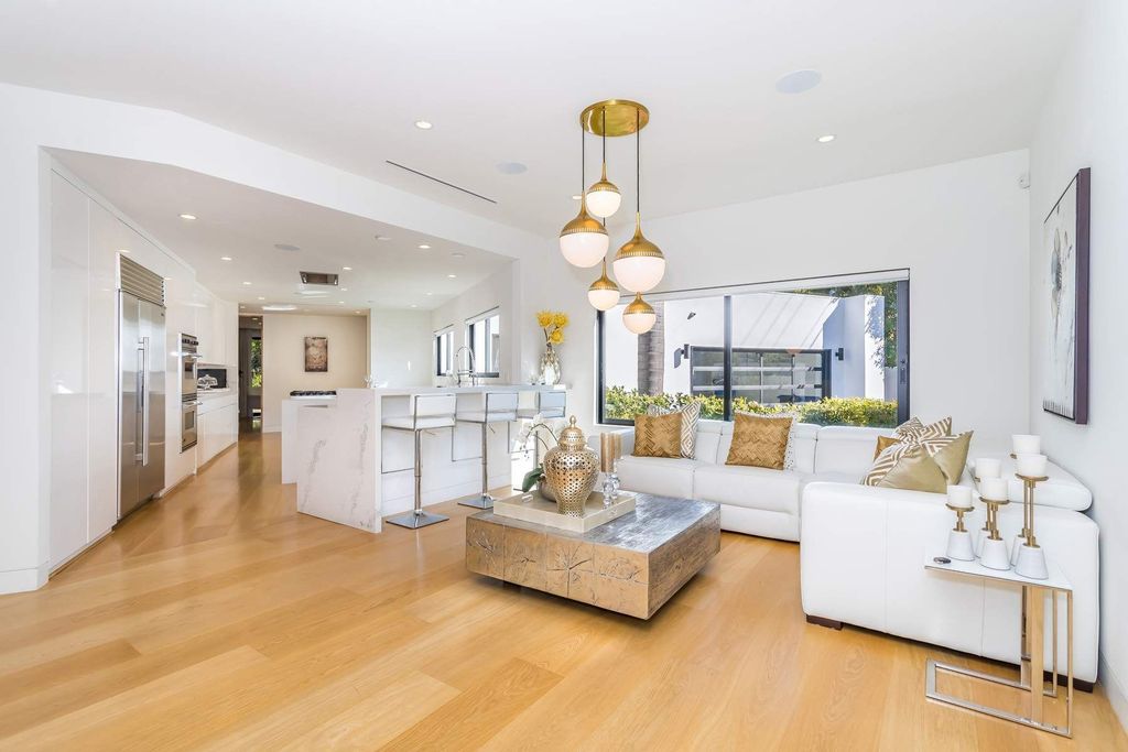 The Home in Beverly Hills is a stunning contemporary compound in a coveted lower Coldwater Canyon now available for sale. This home located at 9565 Cherokee Ln, Beverly Hills, California