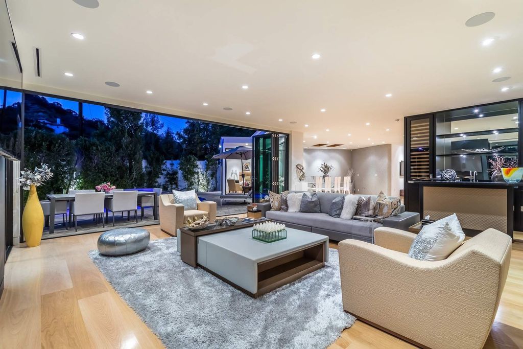 The Home in Beverly Hills is a stunning contemporary compound in a coveted lower Coldwater Canyon now available for sale. This home located at 9565 Cherokee Ln, Beverly Hills, California