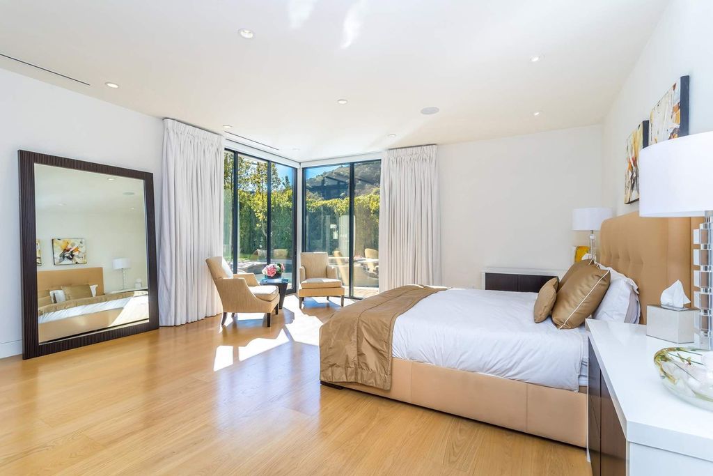 The Home in Beverly Hills is a stunning contemporary compound in a coveted lower Coldwater Canyon now available for sale. This home located at 9565 Cherokee Ln, Beverly Hills, California
