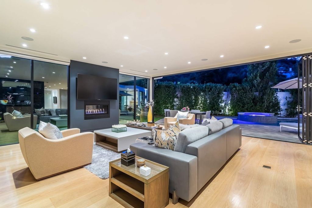 The Home in Beverly Hills is a stunning contemporary compound in a coveted lower Coldwater Canyon now available for sale. This home located at 9565 Cherokee Ln, Beverly Hills, California