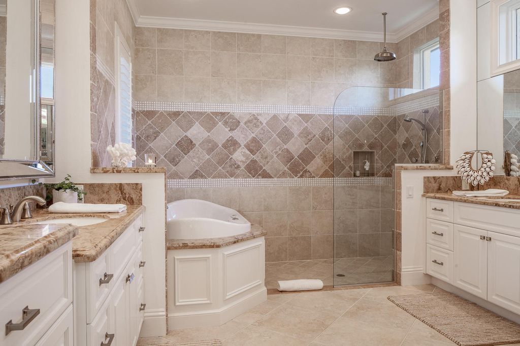The Home in Naples is a custom residence with glorious southern exposure, soaring ceilings and floor to ceiling windows now available for sale. This home located at 750 Fountainhead Ln, Naples, Florida