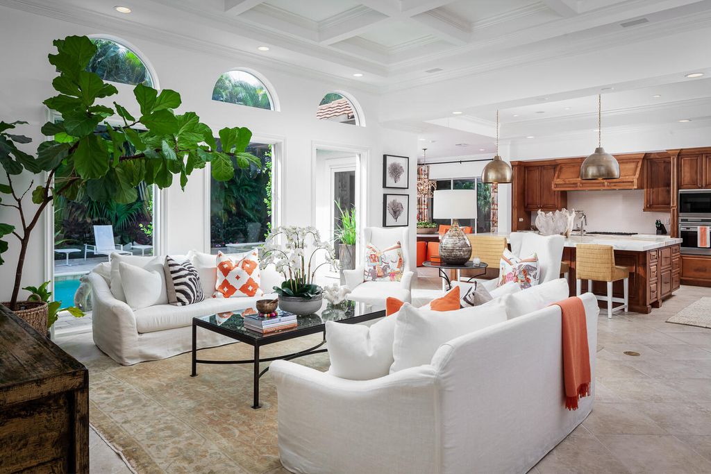 The Home in Naples is a custom residence with glorious southern exposure, soaring ceilings and floor to ceiling windows now available for sale. This home located at 750 Fountainhead Ln, Naples, Florida