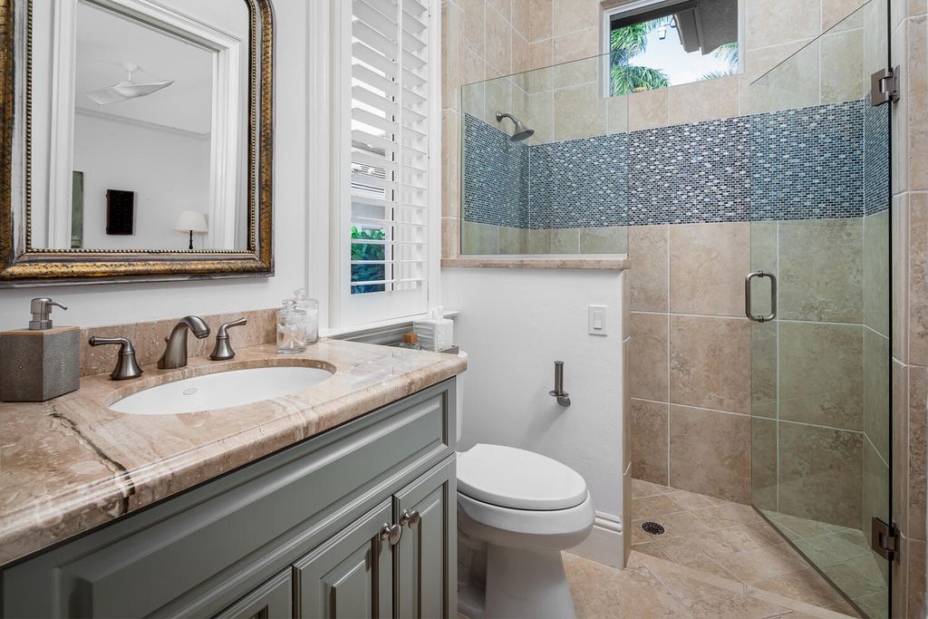 The Home in Naples is a custom residence with glorious southern exposure, soaring ceilings and floor to ceiling windows now available for sale. This home located at 750 Fountainhead Ln, Naples, Florida