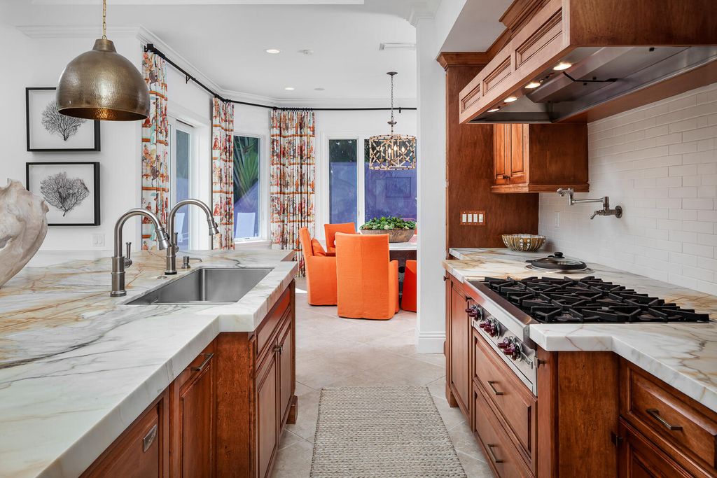 The Home in Naples is a custom residence with glorious southern exposure, soaring ceilings and floor to ceiling windows now available for sale. This home located at 750 Fountainhead Ln, Naples, Florida