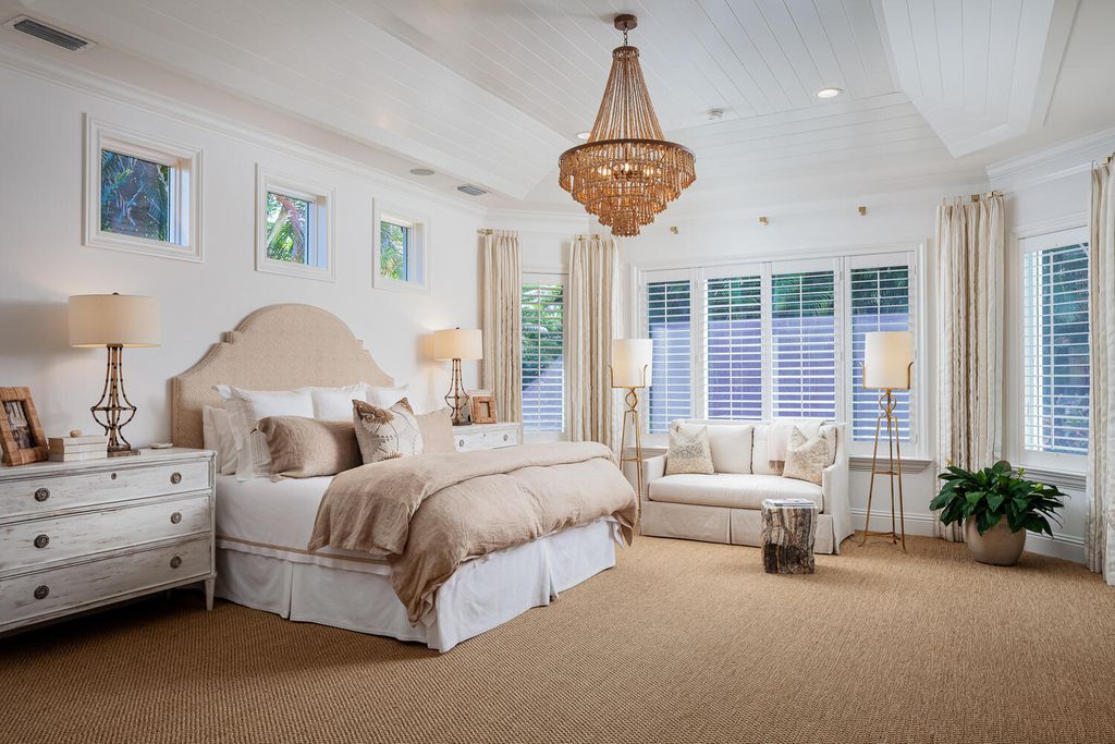 The Home in Naples is a custom residence with glorious southern exposure, soaring ceilings and floor to ceiling windows now available for sale. This home located at 750 Fountainhead Ln, Naples, Florida