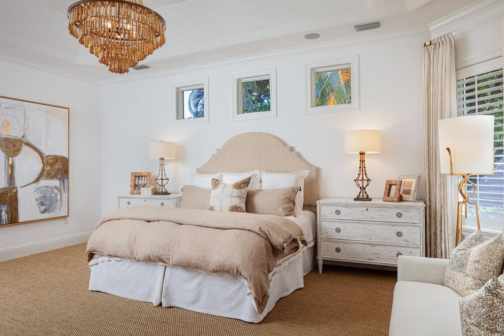 The Home in Naples is a custom residence with glorious southern exposure, soaring ceilings and floor to ceiling windows now available for sale. This home located at 750 Fountainhead Ln, Naples, Florida