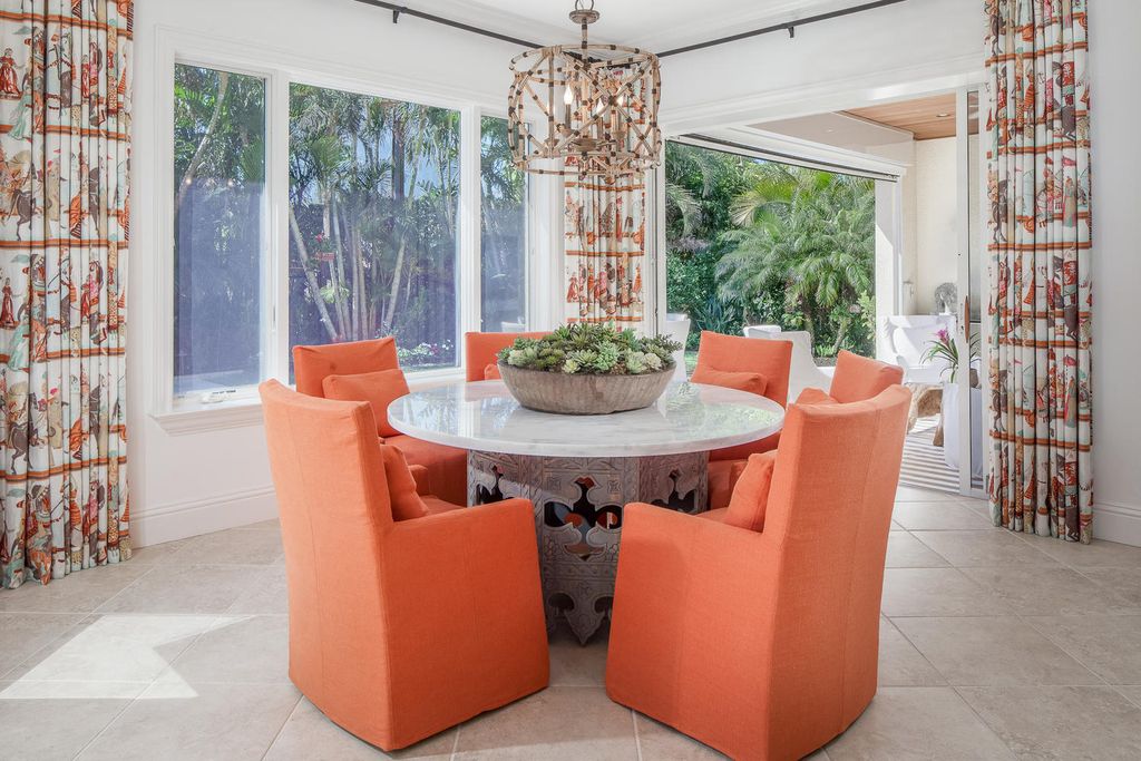 The Home in Naples is a custom residence with glorious southern exposure, soaring ceilings and floor to ceiling windows now available for sale. This home located at 750 Fountainhead Ln, Naples, Florida