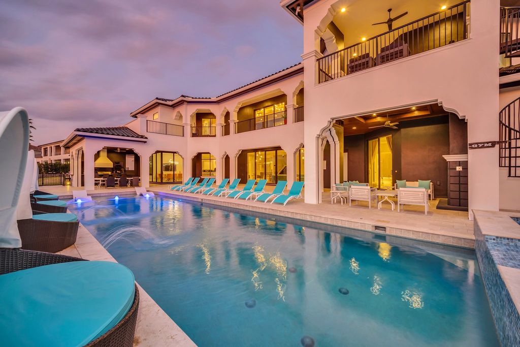 The Home in Reunion is a stunning fully furnished residence has an open contemporary floor plan which exudes luxury now available for sale. This home located at 521 Muirfield Loop, Reunion, Florida