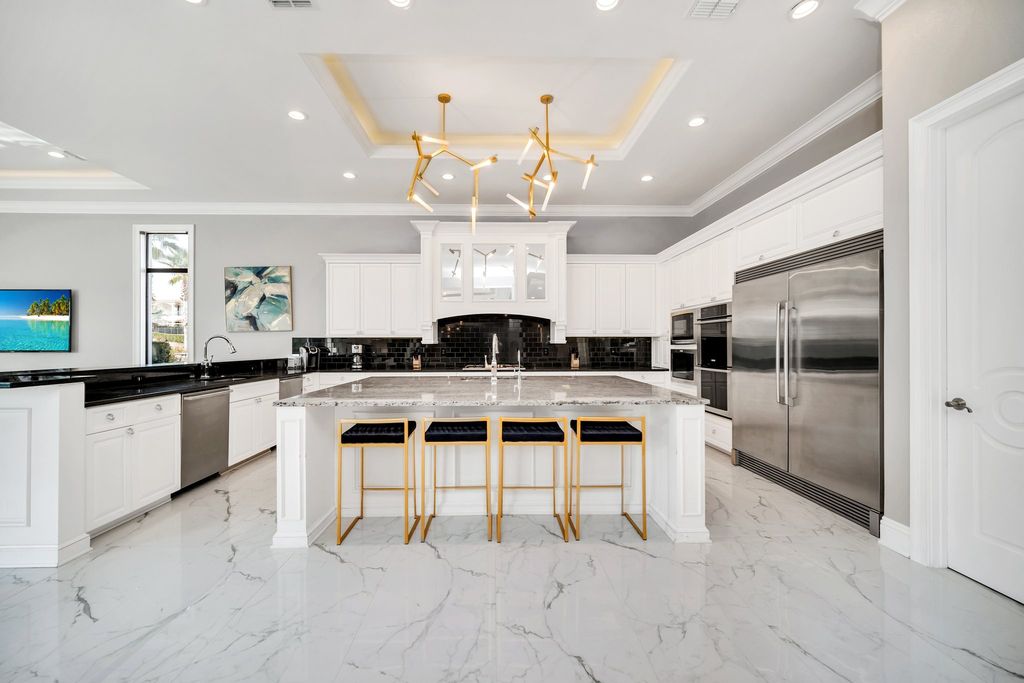 The Home in Reunion is a stunning fully furnished residence has an open contemporary floor plan which exudes luxury now available for sale. This home located at 521 Muirfield Loop, Reunion, Florida
