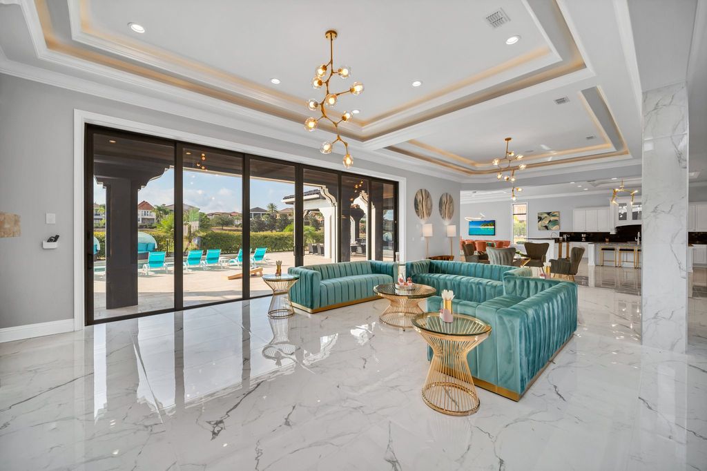 The Home in Reunion is a stunning fully furnished residence has an open contemporary floor plan which exudes luxury now available for sale. This home located at 521 Muirfield Loop, Reunion, Florida