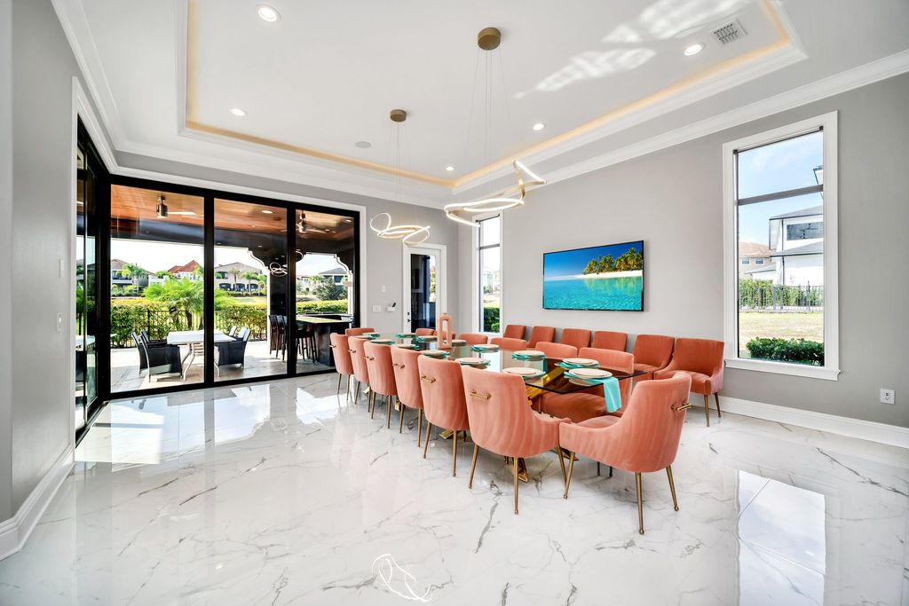The Home in Reunion is a stunning fully furnished residence has an open contemporary floor plan which exudes luxury now available for sale. This home located at 521 Muirfield Loop, Reunion, Florida