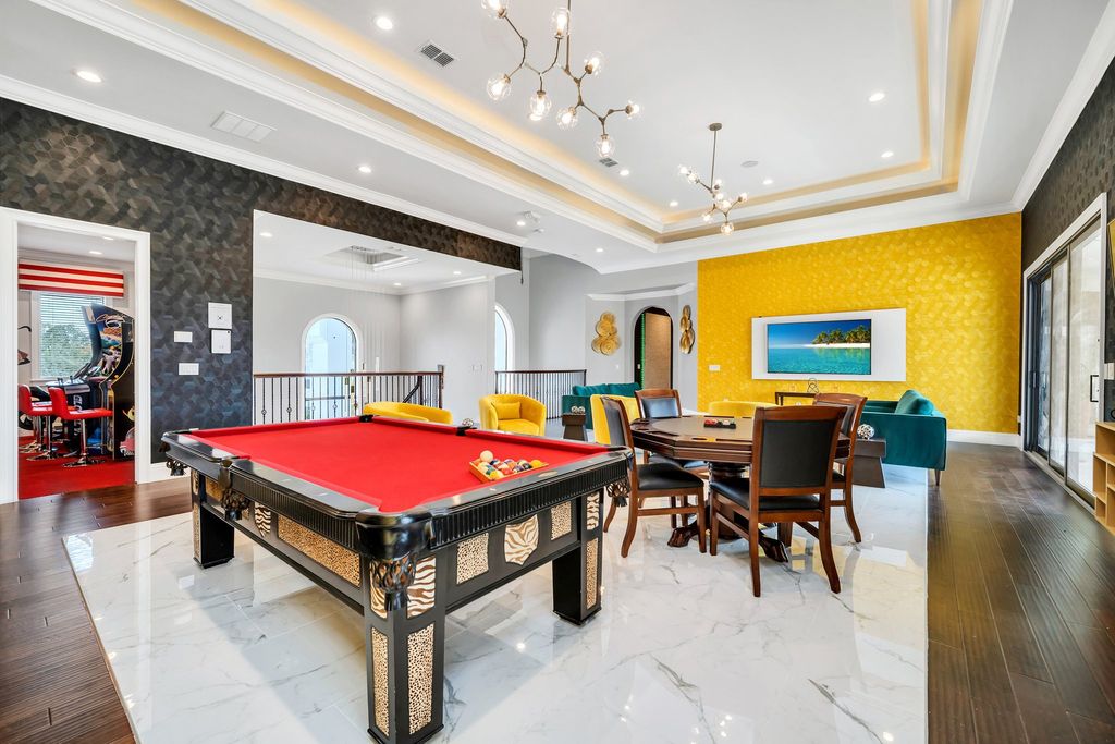 The Home in Reunion is a stunning fully furnished residence has an open contemporary floor plan which exudes luxury now available for sale. This home located at 521 Muirfield Loop, Reunion, Florida