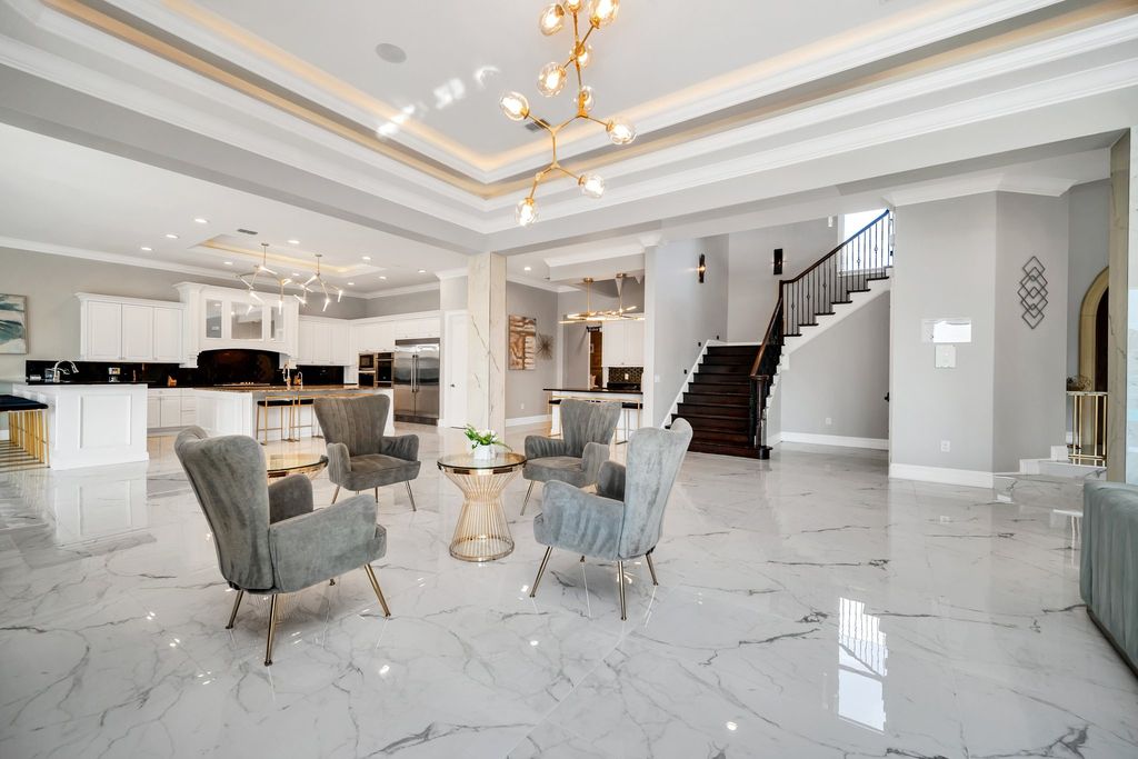 The Home in Reunion is a stunning fully furnished residence has an open contemporary floor plan which exudes luxury now available for sale. This home located at 521 Muirfield Loop, Reunion, Florida