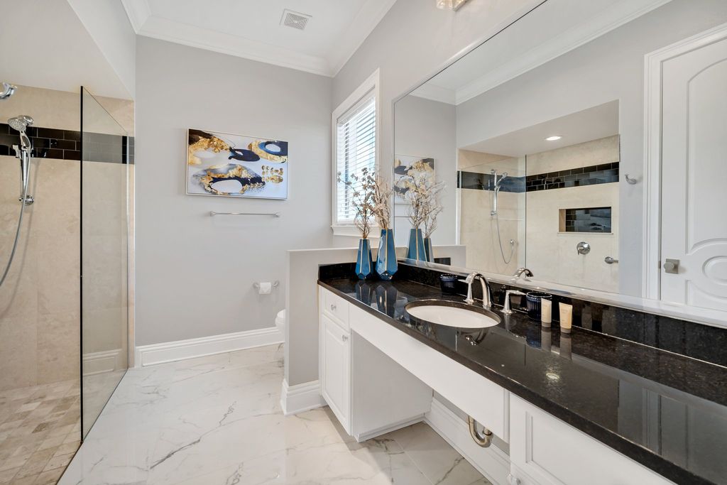 The Home in Reunion is a stunning fully furnished residence has an open contemporary floor plan which exudes luxury now available for sale. This home located at 521 Muirfield Loop, Reunion, Florida