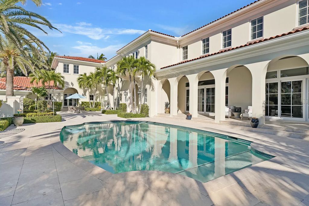 The Lake Worth Mansion is a contemporary South Florida ultra luxury waterfront real estate masterpiece boasting unparalleled resort inspired comforts now available for sale. This home located at 1400 S Ocean Blvd, Lake Worth, Florida