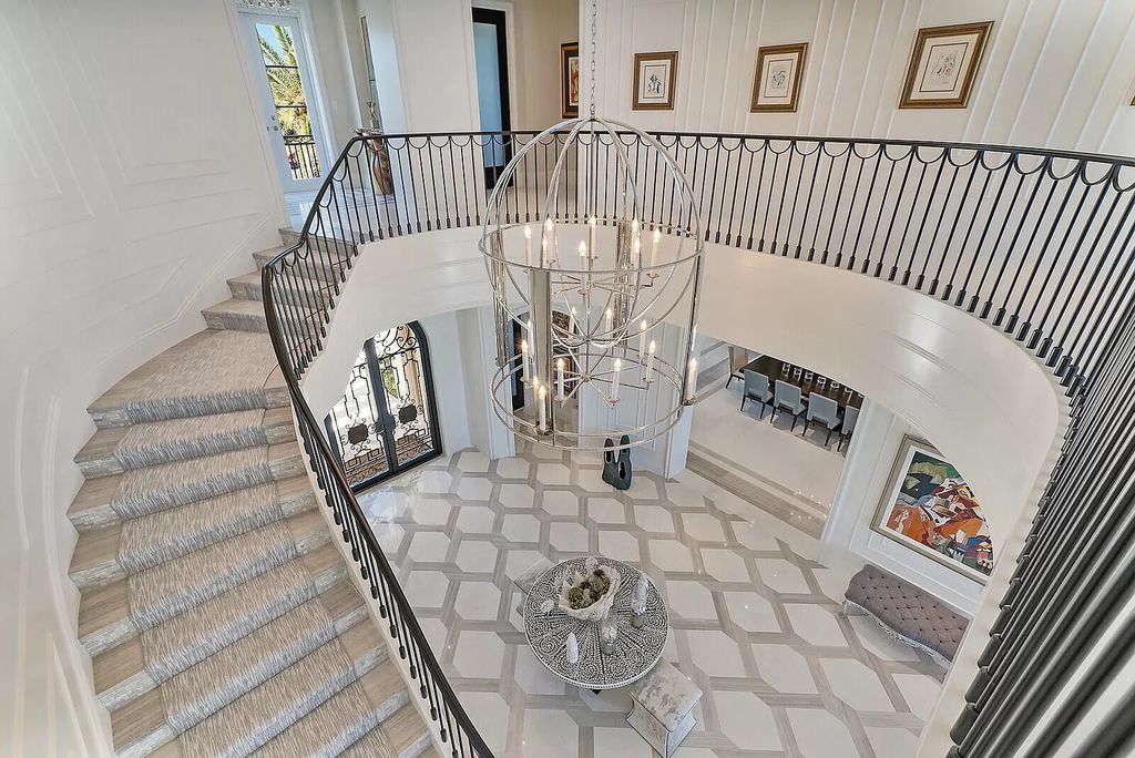 The Lake Worth Mansion is a contemporary South Florida ultra luxury waterfront real estate masterpiece boasting unparalleled resort inspired comforts now available for sale. This home located at 1400 S Ocean Blvd, Lake Worth, Florida