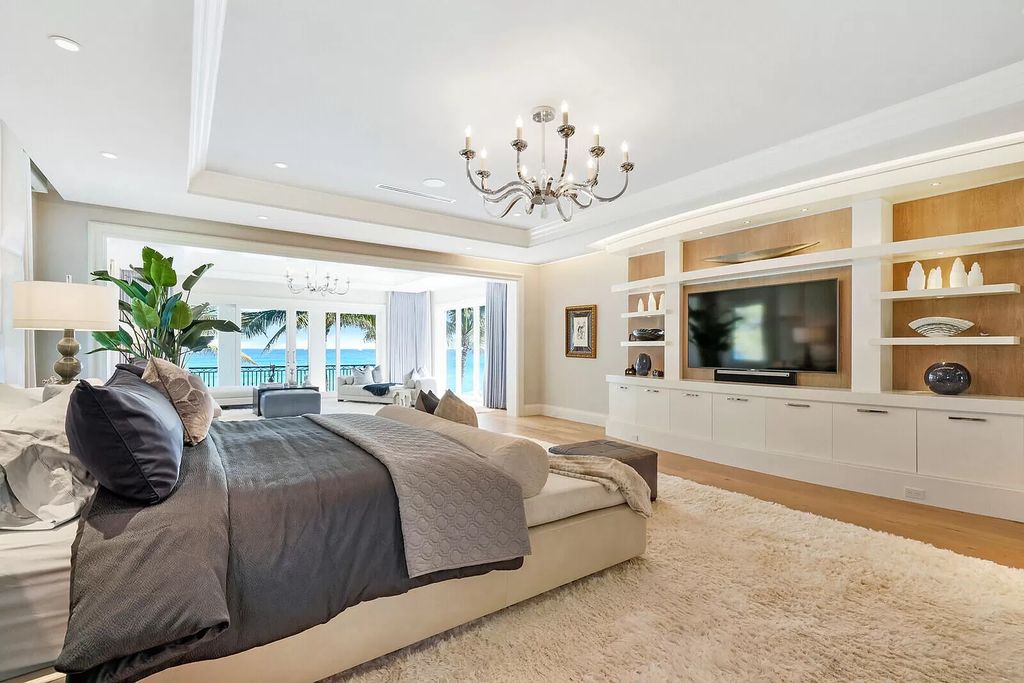 The Lake Worth Mansion is a contemporary South Florida ultra luxury waterfront real estate masterpiece boasting unparalleled resort inspired comforts now available for sale. This home located at 1400 S Ocean Blvd, Lake Worth, Florida