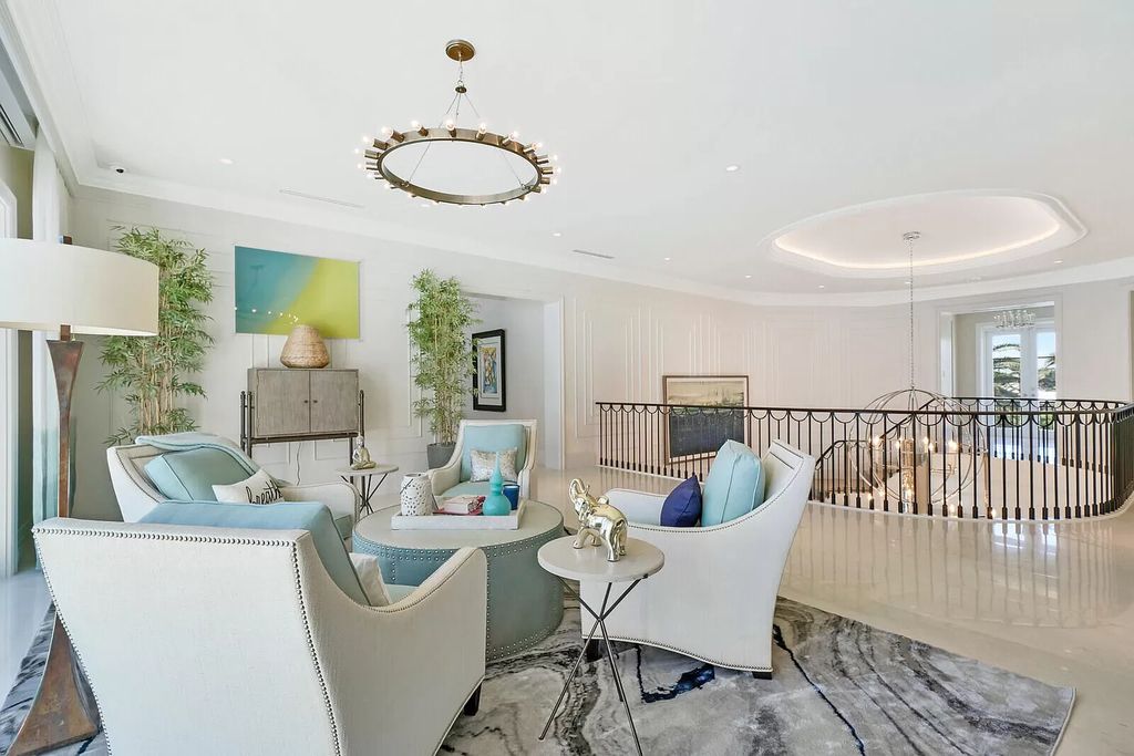 The Lake Worth Mansion is a contemporary South Florida ultra luxury waterfront real estate masterpiece boasting unparalleled resort inspired comforts now available for sale. This home located at 1400 S Ocean Blvd, Lake Worth, Florida