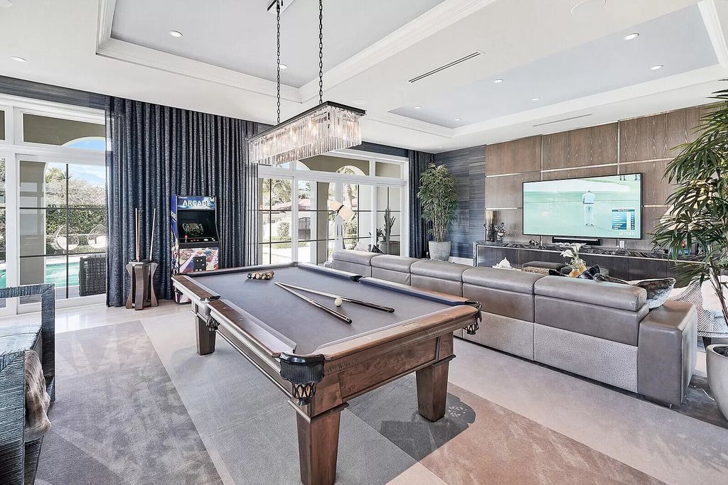 The Lake Worth Mansion is a contemporary South Florida ultra luxury waterfront real estate masterpiece boasting unparalleled resort inspired comforts now available for sale. This home located at 1400 S Ocean Blvd, Lake Worth, Florida