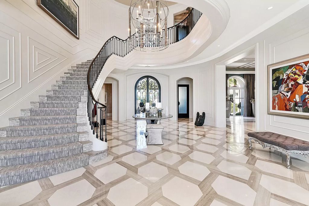 The Lake Worth Mansion is a contemporary South Florida ultra luxury waterfront real estate masterpiece boasting unparalleled resort inspired comforts now available for sale. This home located at 1400 S Ocean Blvd, Lake Worth, Florida