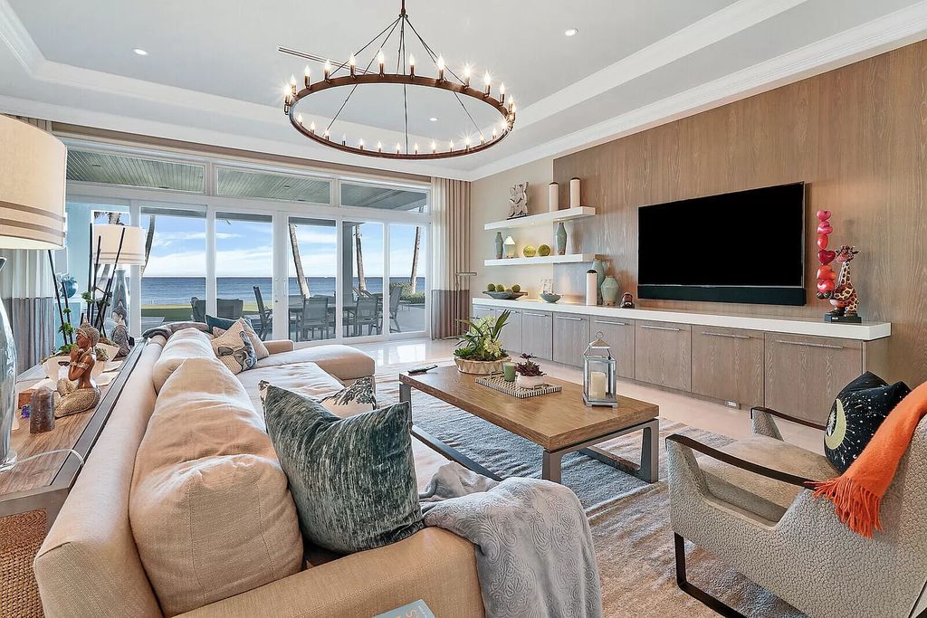 The Lake Worth Mansion is a contemporary South Florida ultra luxury waterfront real estate masterpiece boasting unparalleled resort inspired comforts now available for sale. This home located at 1400 S Ocean Blvd, Lake Worth, Florida