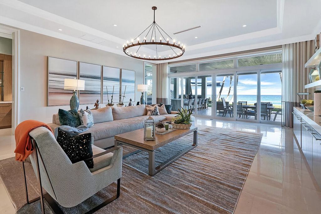 The Lake Worth Mansion is a contemporary South Florida ultra luxury waterfront real estate masterpiece boasting unparalleled resort inspired comforts now available for sale. This home located at 1400 S Ocean Blvd, Lake Worth, Florida
