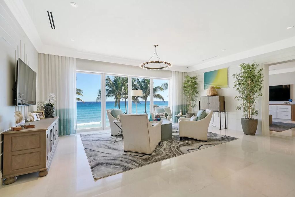 The Lake Worth Mansion is a contemporary South Florida ultra luxury waterfront real estate masterpiece boasting unparalleled resort inspired comforts now available for sale. This home located at 1400 S Ocean Blvd, Lake Worth, Florida