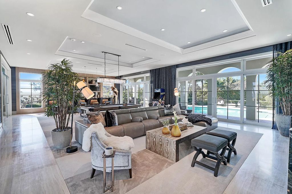 The Lake Worth Mansion is a contemporary South Florida ultra luxury waterfront real estate masterpiece boasting unparalleled resort inspired comforts now available for sale. This home located at 1400 S Ocean Blvd, Lake Worth, Florida